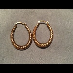 STAMPED 10k GOLD HOOP EARRINGS.